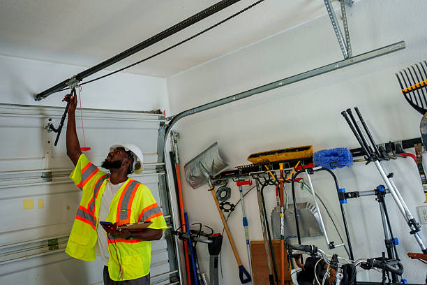Professional Garage Door Panel Replacement technician working in Wapello, IA